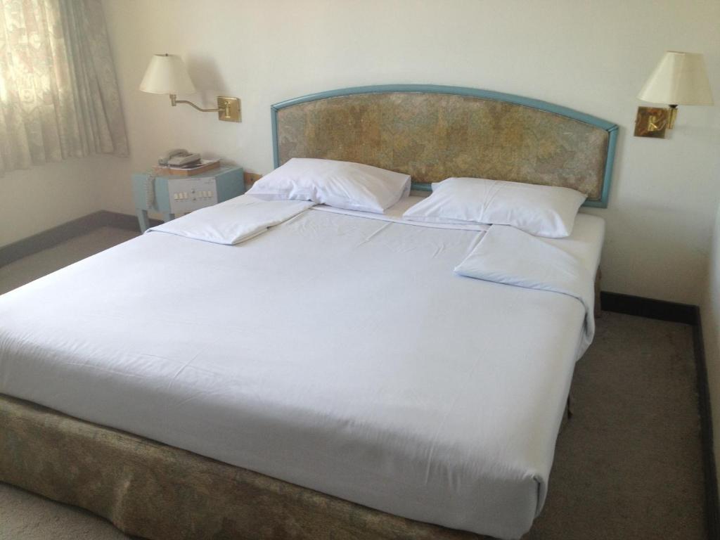 Hotel Sinthavee Phuket Zimmer foto